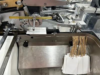 Unidad de ensartado, anudado y recolección